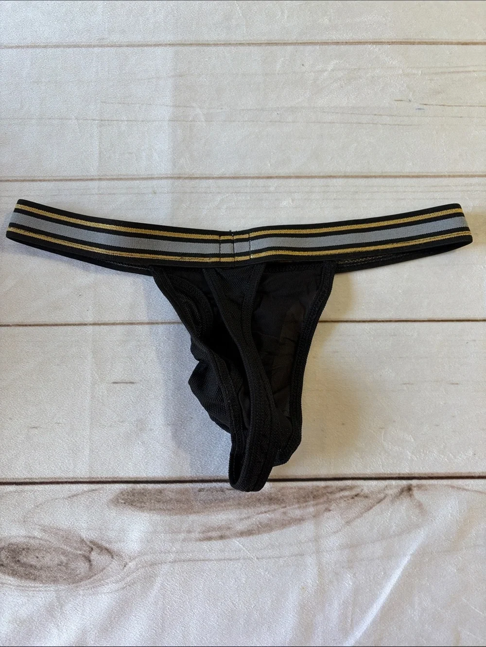 Pistol Pete Men's Black Mesh Thong with Gold Waistband